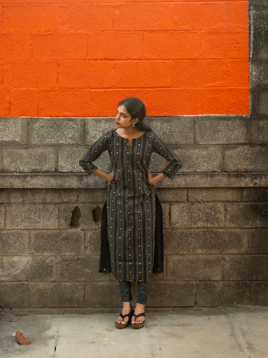 Side view showing full length and graceful silhouette of black cotton silk kurti with inner lining from Sakyaa